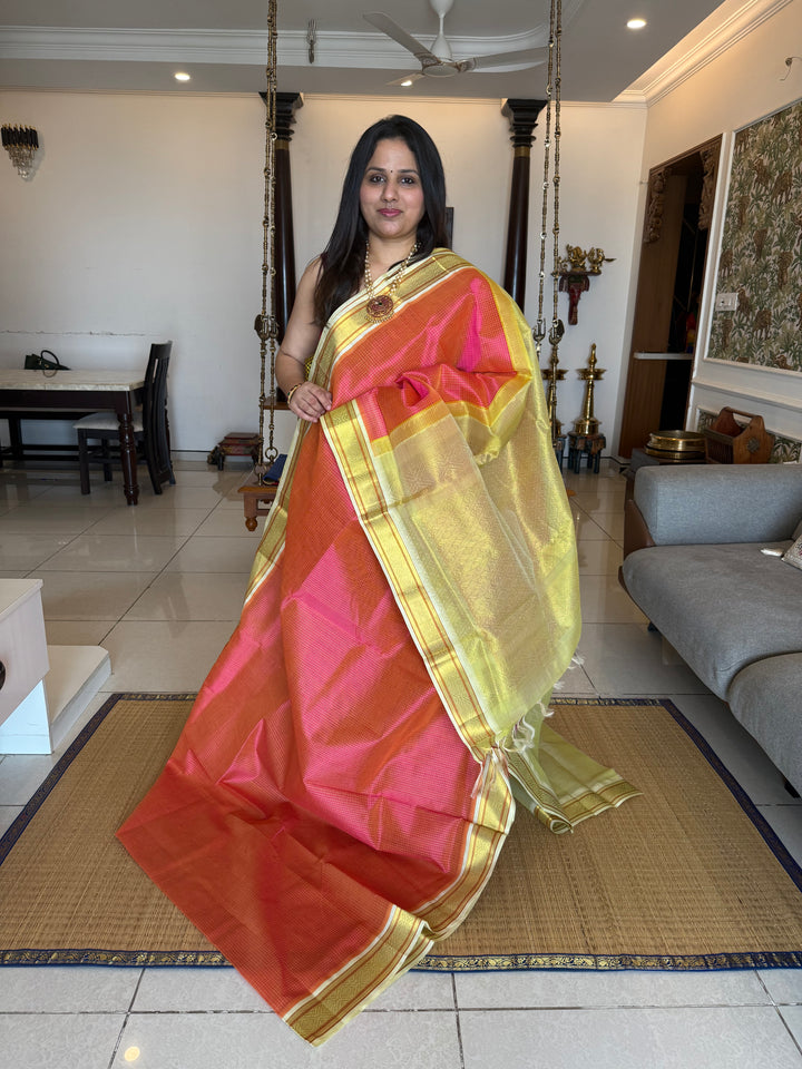 Pink with Pastel Yellow and Offwhite traditional border , checks in the body and grand Pallu Korvai Silk Cotton Saree