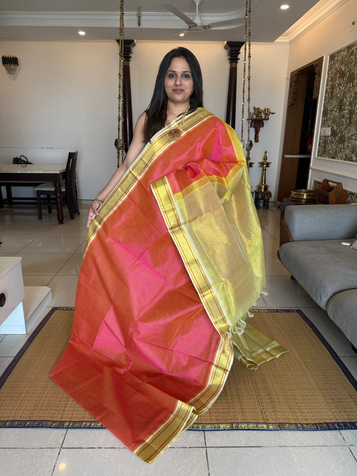 Pink with Pastel Yellow and Offwhite traditional border , checks in the body and grand Pallu Korvai Silk Cotton Saree