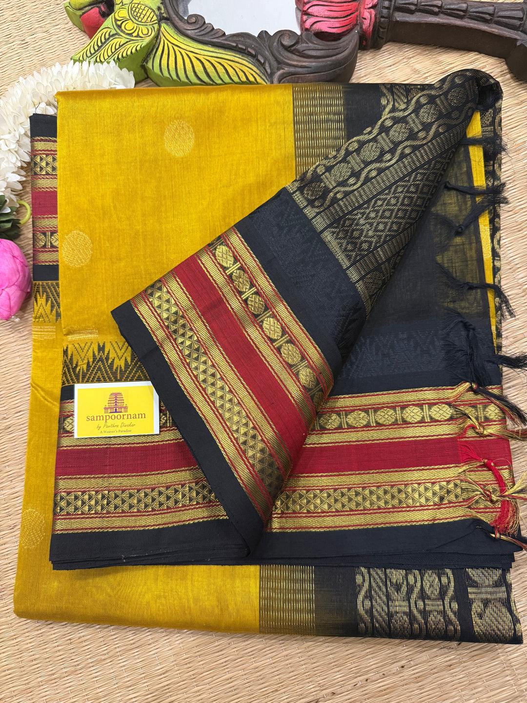 Mustard with Black ,rich Zari butta in the body , traditional rettapet temple thread borders and grand Pallu Korvai Silk Cotton Saree