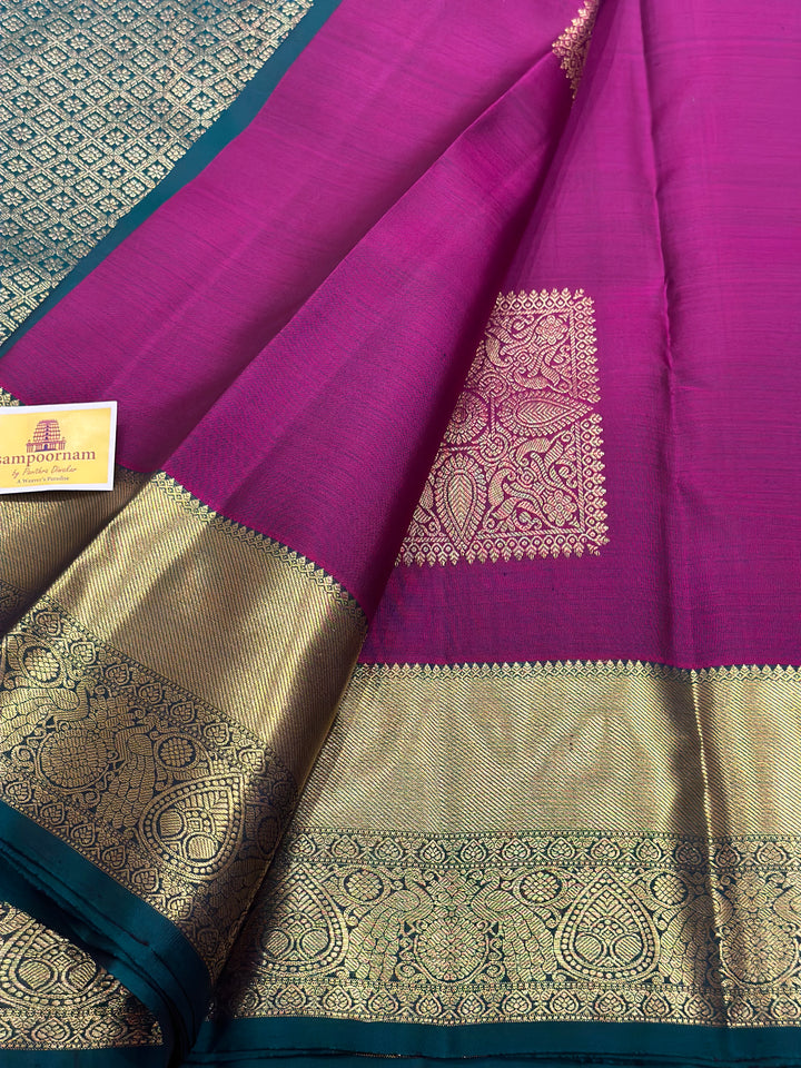 Magenta with Green Rich Butta and Grand Pallu Kanjivaram Silk Saree