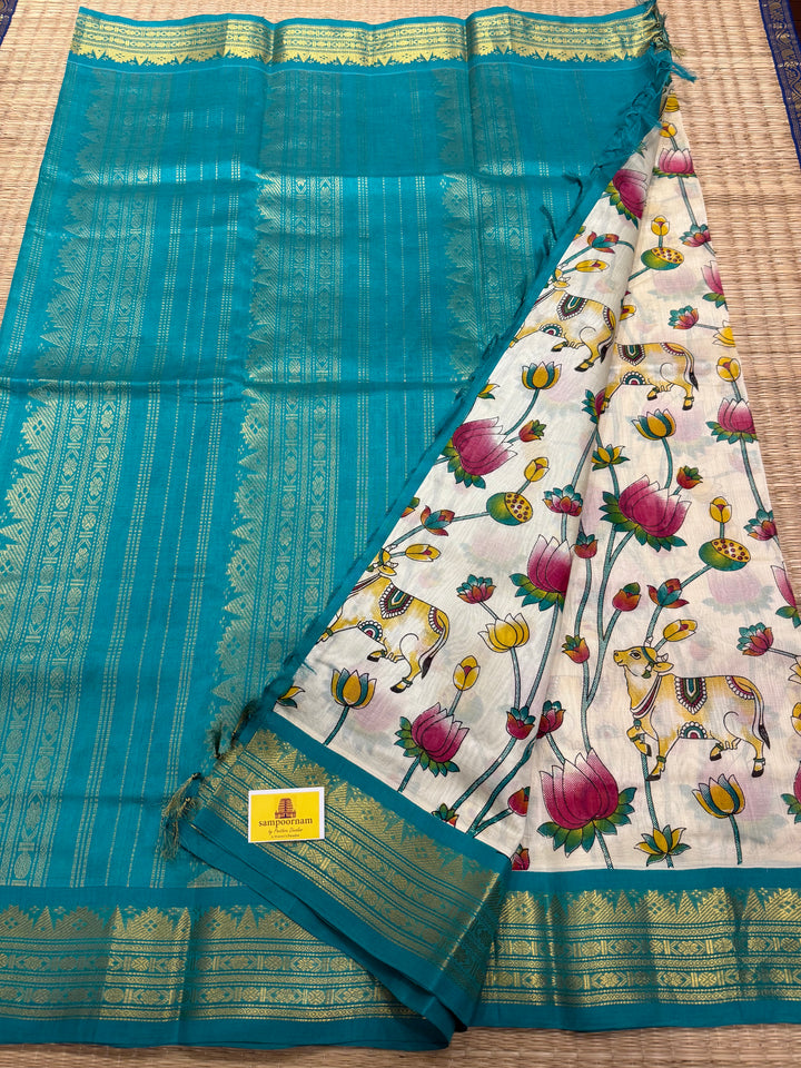 Offwhite with Turquoise traditional borders and rich Pallu , Pichwai printed Korvai Silk Cotton Saree