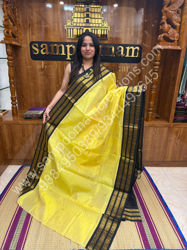 Pale Yellow with Black , rich Zari Mango and Rudraskh Butta in the body , Kanchi  traditional Borders and Grand Pallu Korvai Silk Cotton Saree