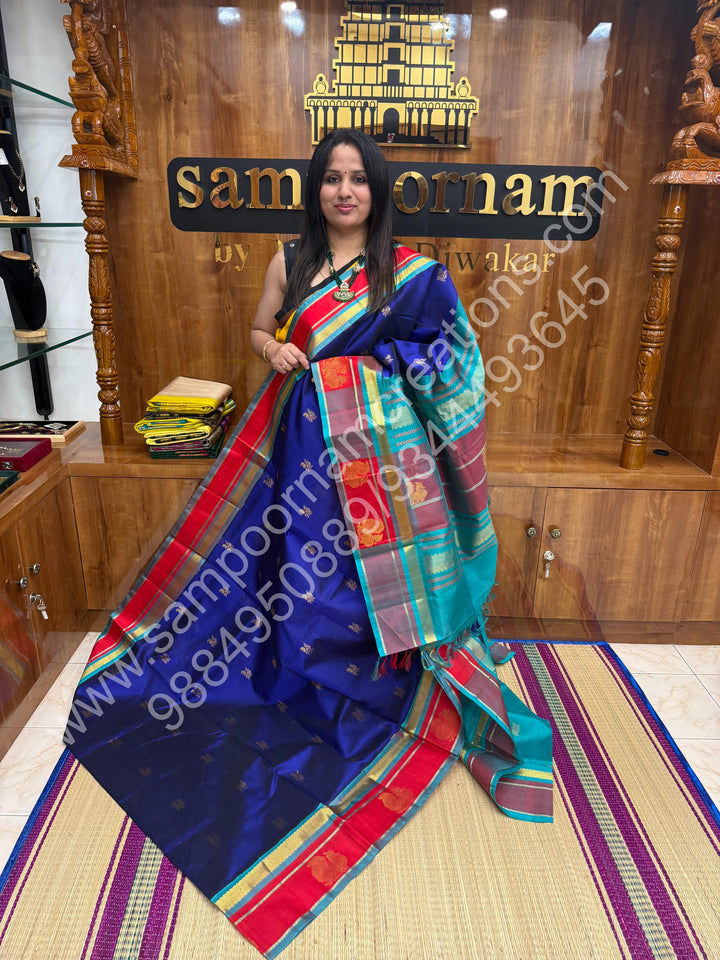 Indigo Blue with Turquoise Blue  , rich Zari Mango and Annam Butta in the body , traditional Borders and Grand Pallu Korvai Silk Cotton Saree