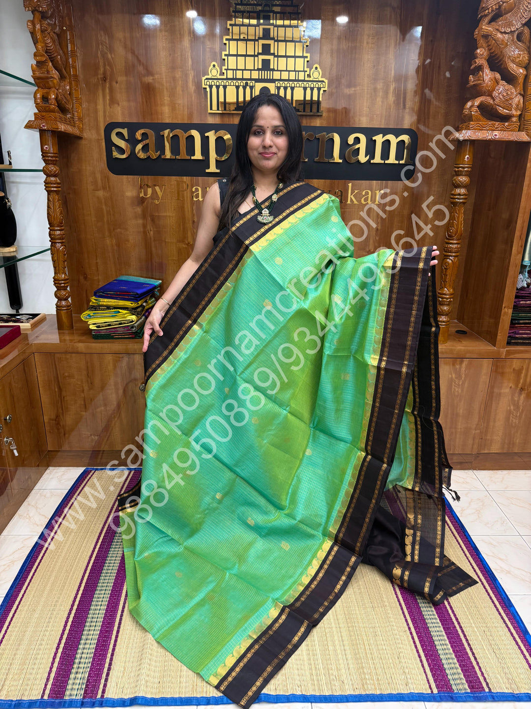Sea Green Gold with Dark Brown , Zari checks , Mayil and Chakram rich butta in the body , rich borders with traditional Pallu Korvai Silk Cotton Saree