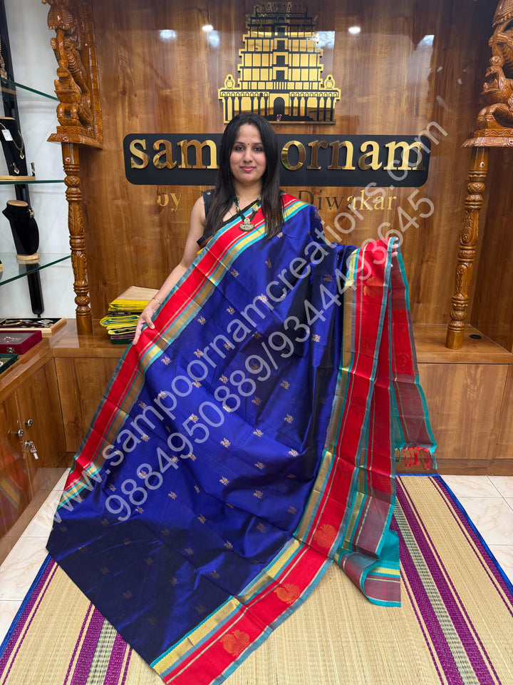 Indigo Blue with Turquoise Blue  , rich Zari Mango and Annam Butta in the body , traditional Borders and Grand Pallu Korvai Silk Cotton Saree