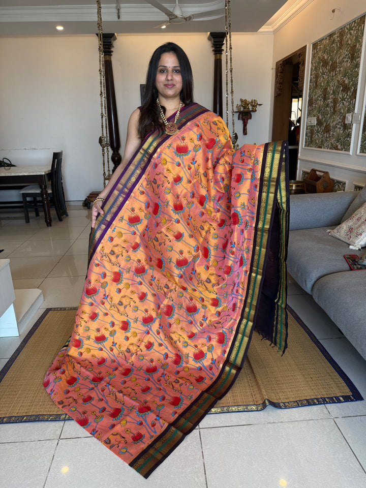 Peachish Orange with Ganga Jamuna borders Brown and Purple ,  rich Pallu Pichwai printed Korvai Silk Cotton Saree
