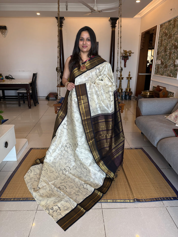 Offwhite with Brown traditional borders and  rich Pallu , Pichwai outline printed Korvai Silk Cotton Saree