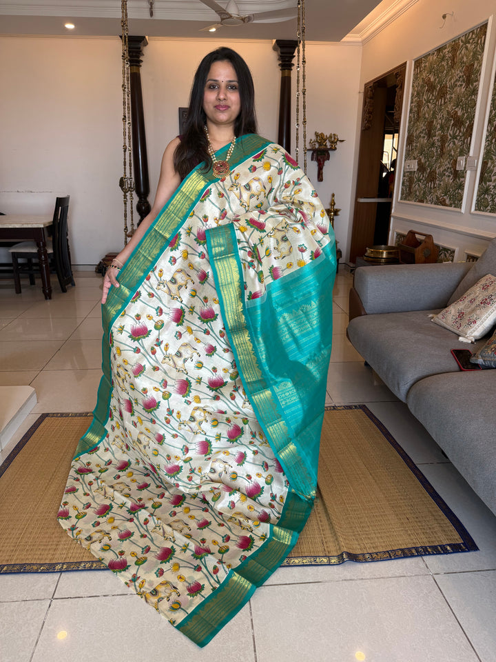 Offwhite with Turquoise traditional borders and rich Pallu , Pichwai printed Korvai Silk Cotton Saree