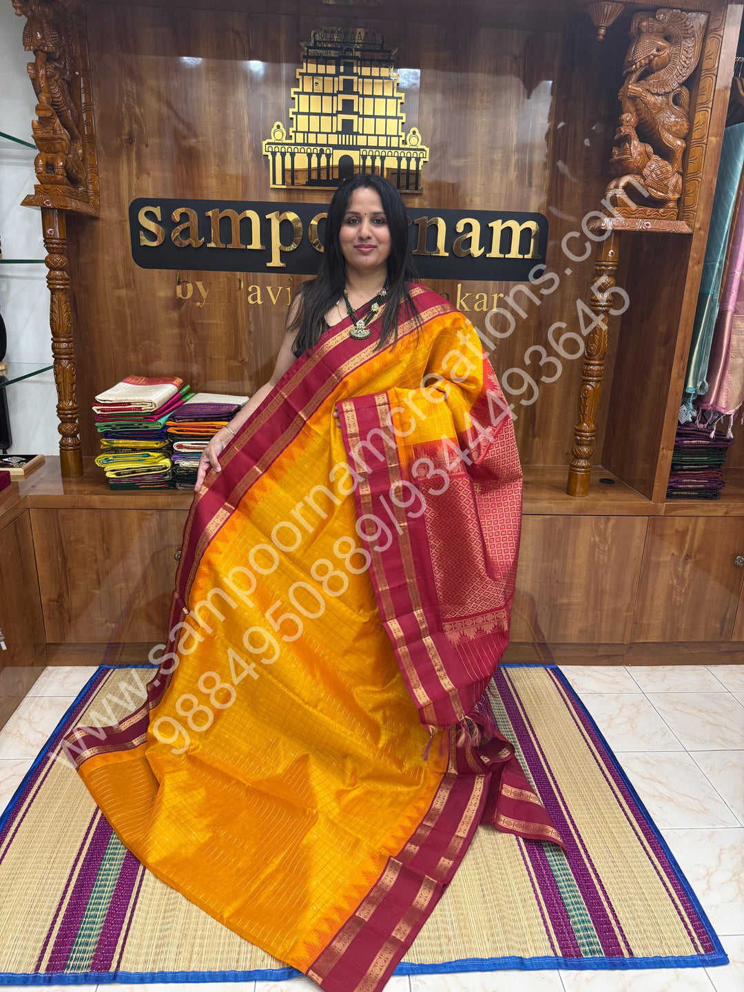 Mambazha Manjal with Red  , rich Zari checks in the body , Temple designs with Rettapet Borders and Grand Pallu Korvai Silk Cotton Saree