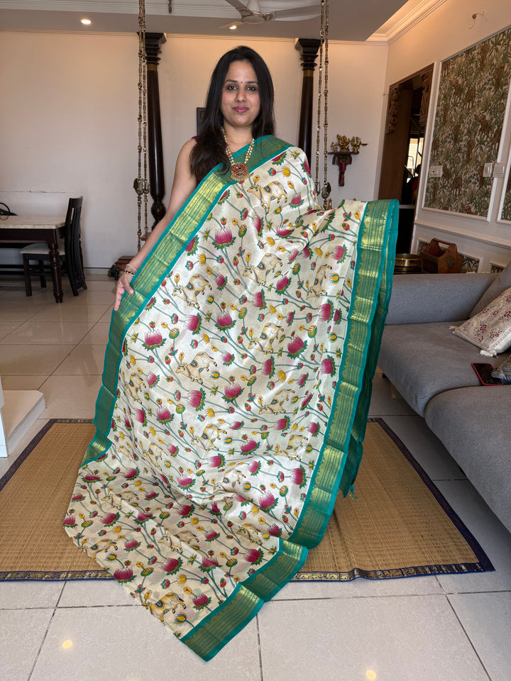 Offwhite with Turquoise traditional borders and rich Pallu , Pichwai printed Korvai Silk Cotton Saree