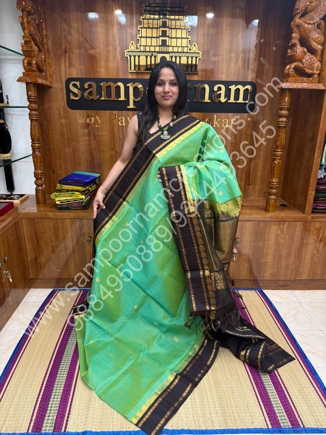 Sea Green Gold with Dark Brown , Zari checks , Mayil and Chakram rich butta in the body , rich borders with traditional Pallu Korvai Silk Cotton Saree
