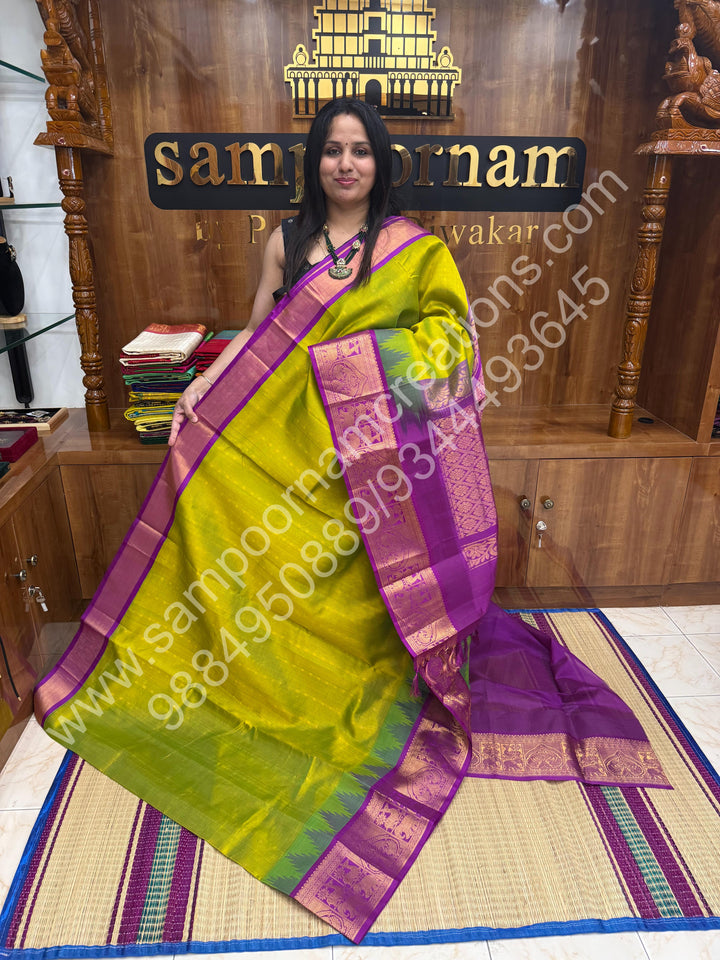 Parrot Green with Magenta  , rich Zari butta and Podi Kattam in the body , temple design traditional Borders and Grand Pallu Korvai Silk Cotton Saree