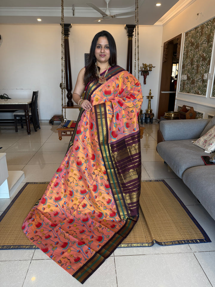 Peachish Orange with Ganga Jamuna borders Brown and Purple ,  rich Pallu Pichwai printed Korvai Silk Cotton Saree