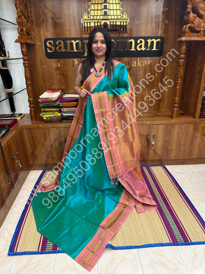 Ramar Green with Salmon Pink  , traditional borders and rich Pallu Korvai Silk Cotton Saree