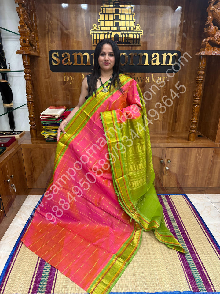 Candy Pink with Lemon Green  , rich Zari checks and Butta in the in the body , traditional Borders and Grand Pallu Korvai Silk Cotton Saree