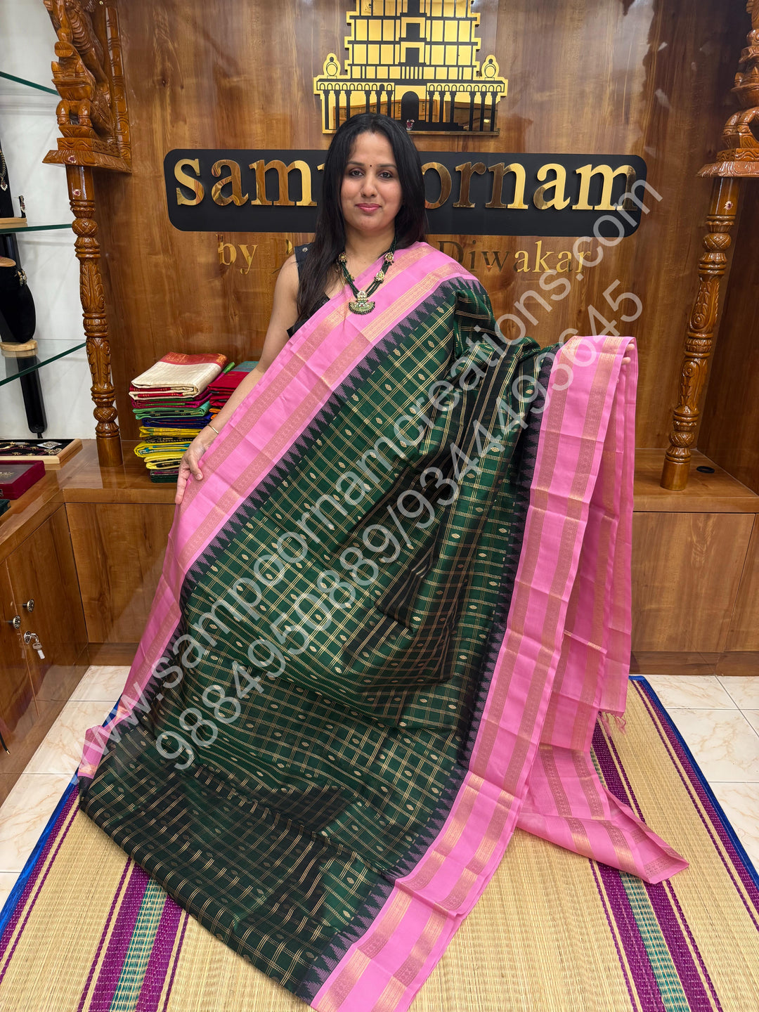 Dark Green with Baby Pink  , rich Zari checks in the body , Temple designs with Rettapet Borders and Grand Pallu Korvai Silk Cotton Saree