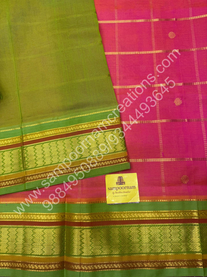 Candy Pink with Lemon Green  , rich Zari checks and Butta in the in the body , traditional Borders and Grand Pallu Korvai Silk Cotton Saree