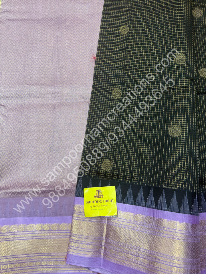 Black with Lilac , rich Zari butta and Podi Kattam in the body  , traditional Borders and Grand Pallu Korvai Silk Cotton Saree