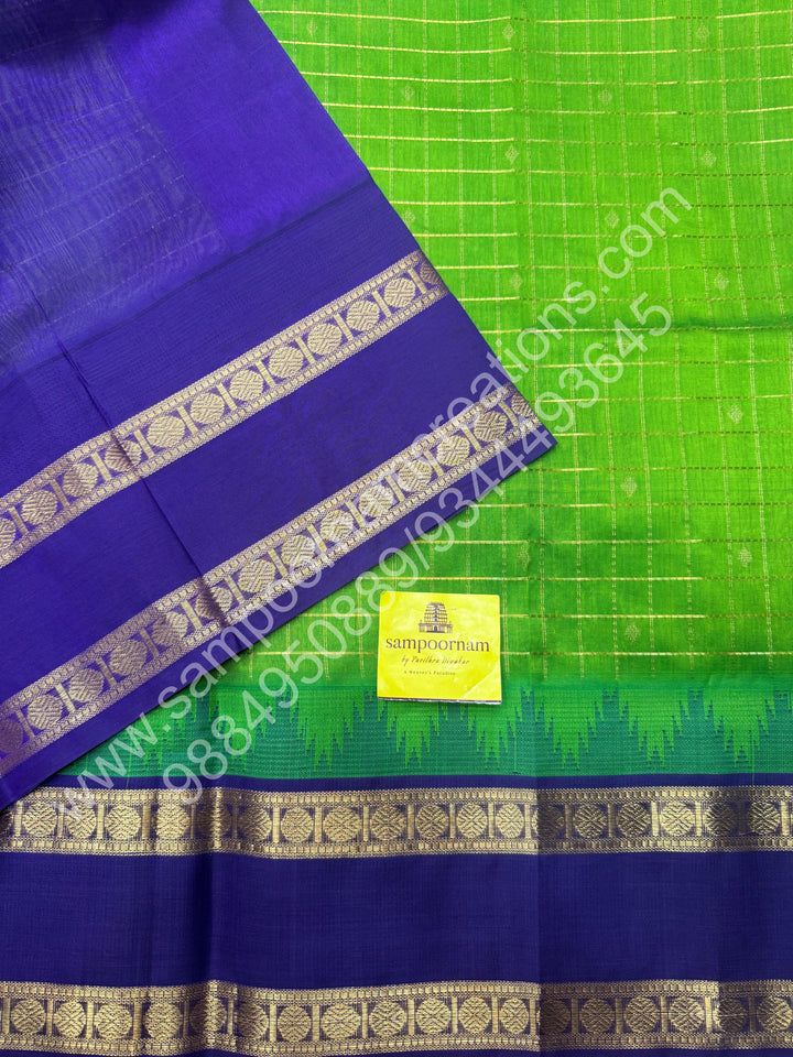 Leaf Green with Indigo Blue  , rich Zari checks in the body , Temple designs with Rettapet Borders and Grand Pallu Korvai Silk Cotton Saree