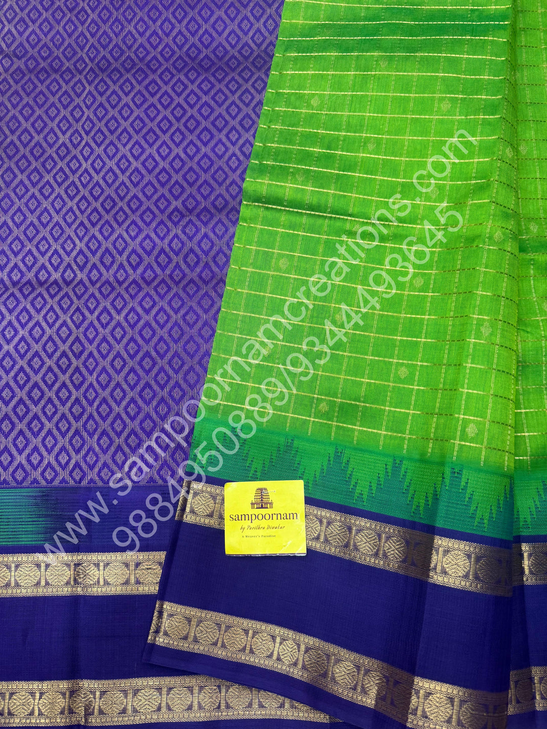 Leaf Green with Indigo Blue  , rich Zari checks in the body , Temple designs with Rettapet Borders and Grand Pallu Korvai Silk Cotton Saree