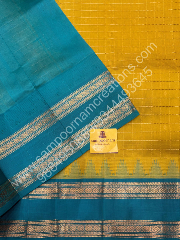 Lemon Green with Turquoise Blue  , rich Zari checks in the body , Temple designs with Rettapet Borders and Grand Pallu Korvai Silk Cotton Saree