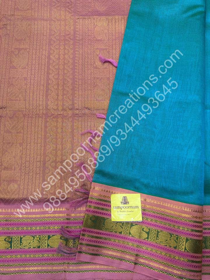 Ramar Green with Salmon Pink  , traditional borders and rich Pallu Korvai Silk Cotton Saree