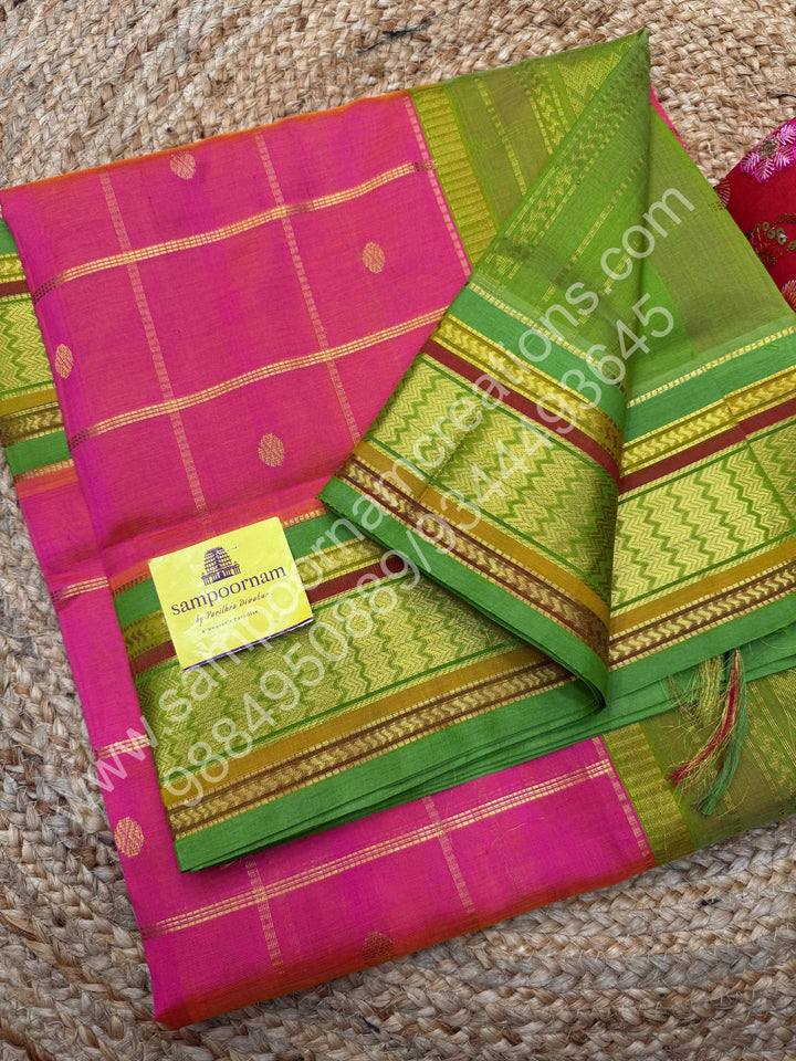 Candy Pink with Lemon Green  , rich Zari checks and Butta in the in the body , traditional Borders and Grand Pallu Korvai Silk Cotton Saree