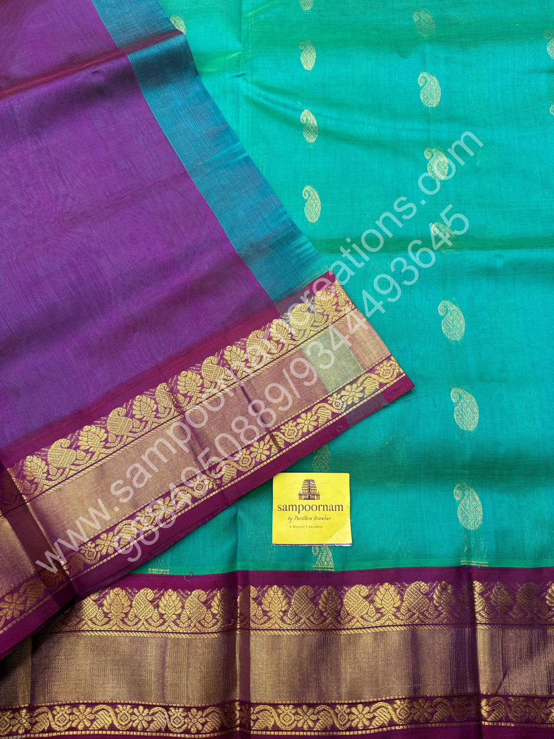 Double Shaded Ramar Green with Dark Maroon  , rich Zari Mango Butta in the body , Silk Borders and Grand Pallu Korvai Silk Cotton Saree