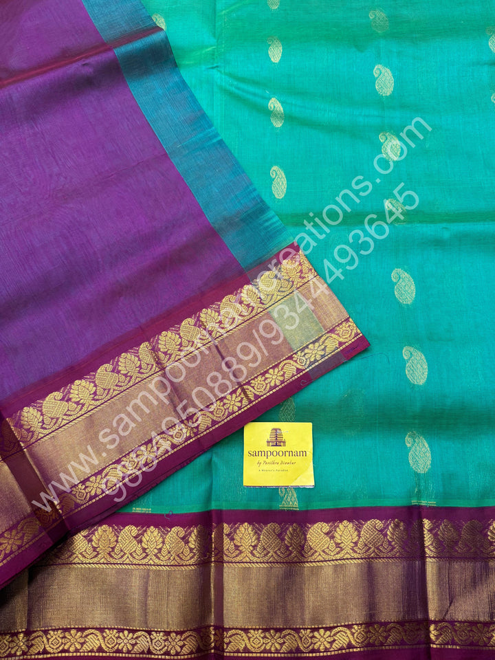 Double Shaded Ramar Green with Dark Maroon  , rich Zari Mango Butta in the body , Silk Borders and Grand Pallu Korvai Silk Cotton Saree