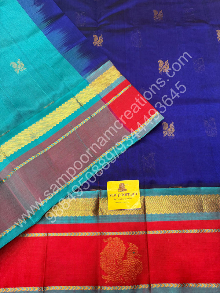 Indigo Blue with Turquoise Blue  , rich Zari Mango and Annam Butta in the body , traditional Borders and Grand Pallu Korvai Silk Cotton Saree