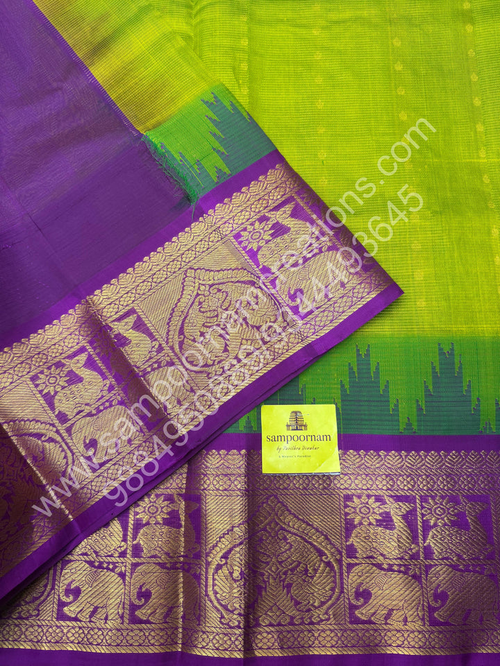 Parrot Green with Magenta  , rich Zari butta and Podi Kattam in the body , temple design traditional Borders and Grand Pallu Korvai Silk Cotton Saree
