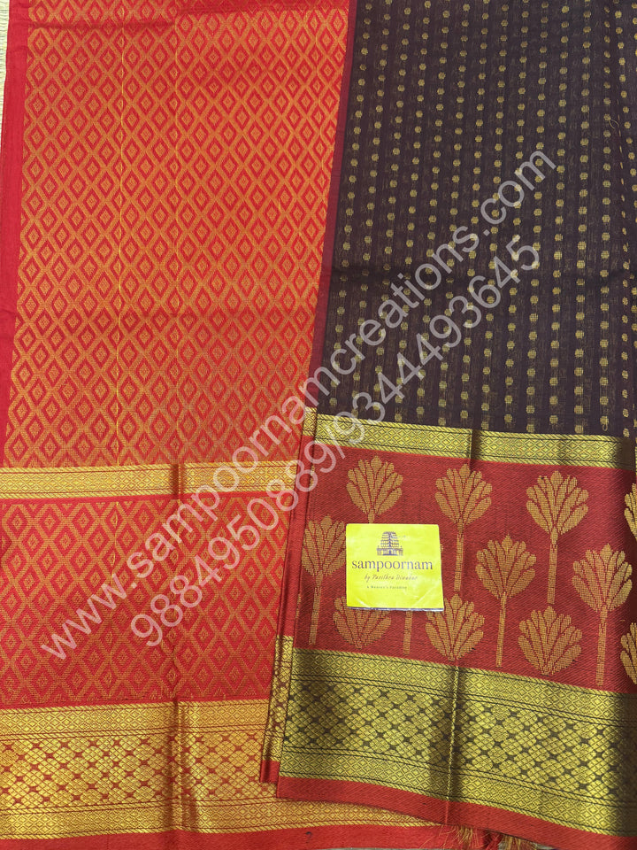 Brown with Red  , rich Zari Lakshadeepam butta in the body , one side long traditional Borders and Grand Pallu Korvai Silk Cotton Saree
