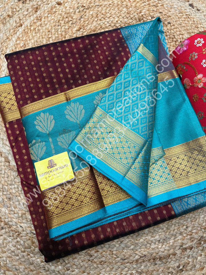 Maroon with Turquoise Blue  , rich Lakshadeepam butta in the body , one side long traditional Borders and Grand Pallu Korvai Silk Cotton Saree
