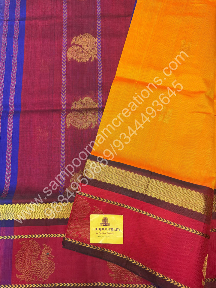 Mambazha Manjal With Indigo Blue  , rich Zari Mango and Annam Butta in the body ,traditional Borders and Grand Pallu Korvai Silk Cotton Saree
