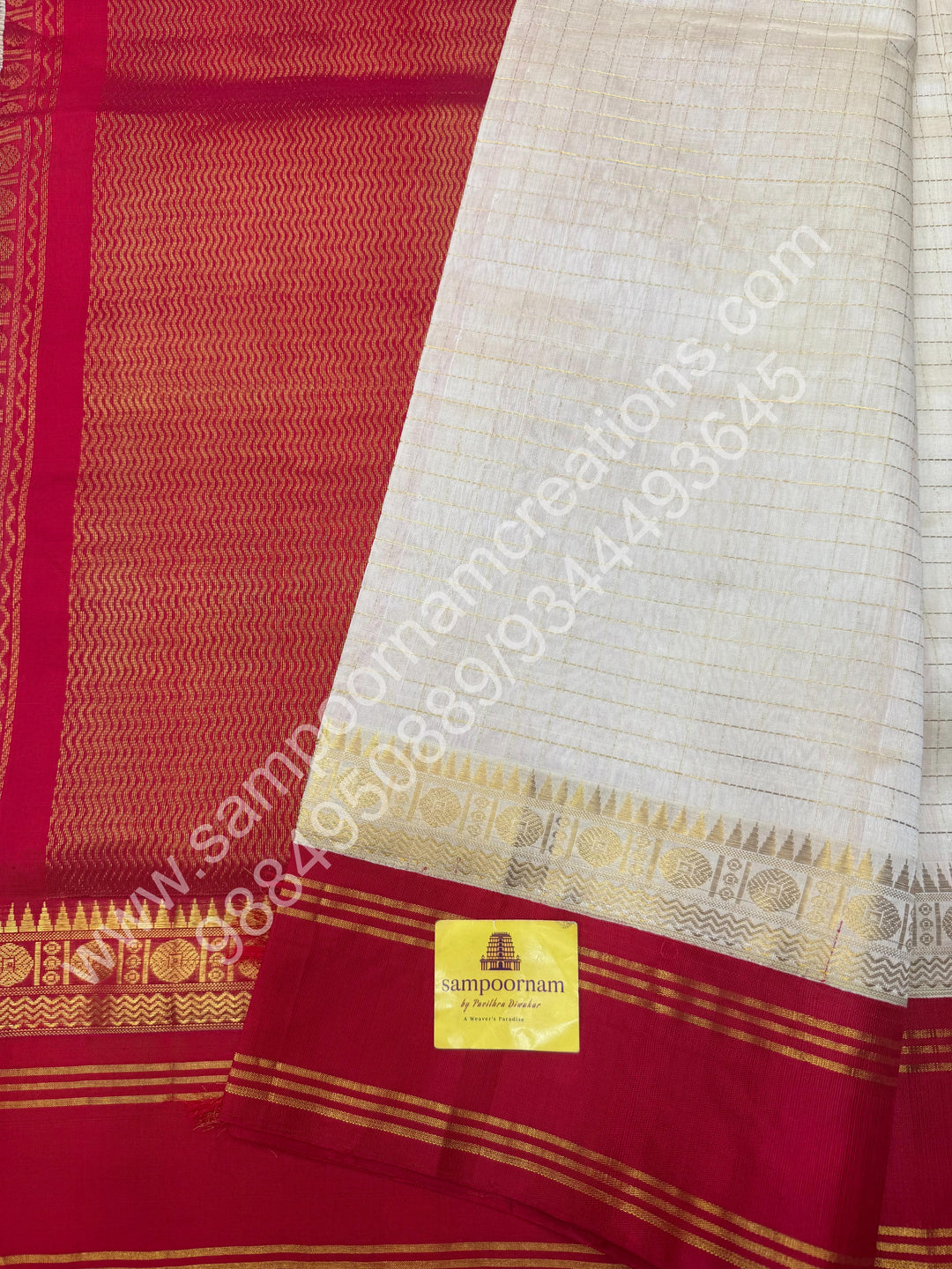 Offwhite with Red , Zari checks in the body , rich borders with traditional Pallu Korvai Silk Cotton Saree