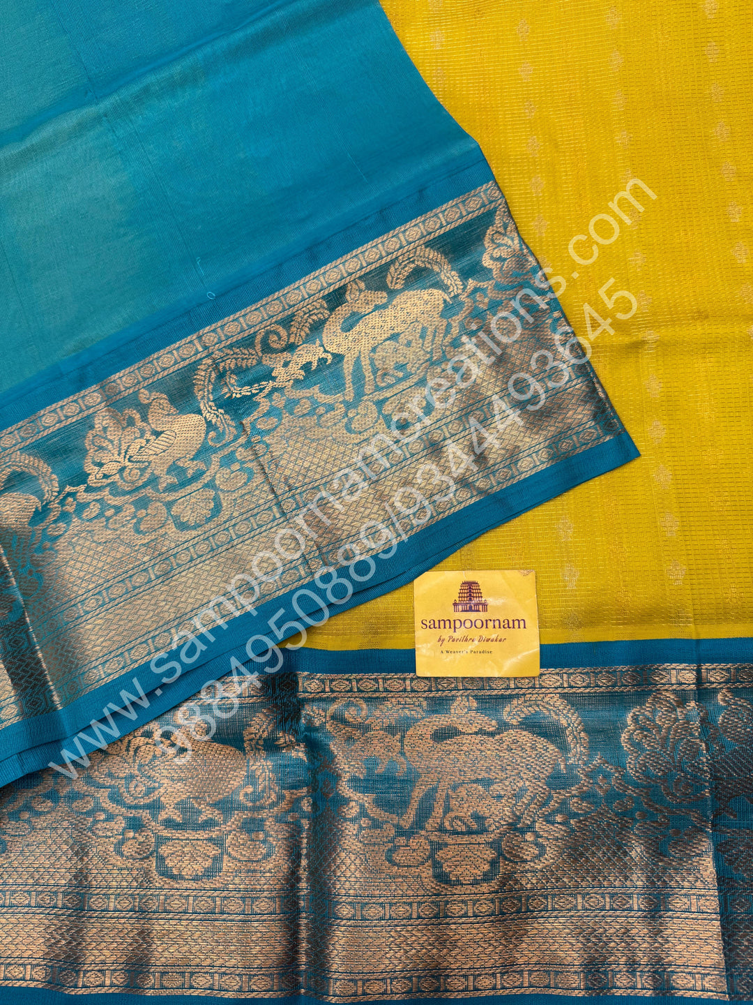 Lemon Yellow with Turquoise Blue  , rich Zari butta and Podi Kattam in the body ,traditional one side long  Borders and Grand Pallu Korvai Silk Cotton Saree