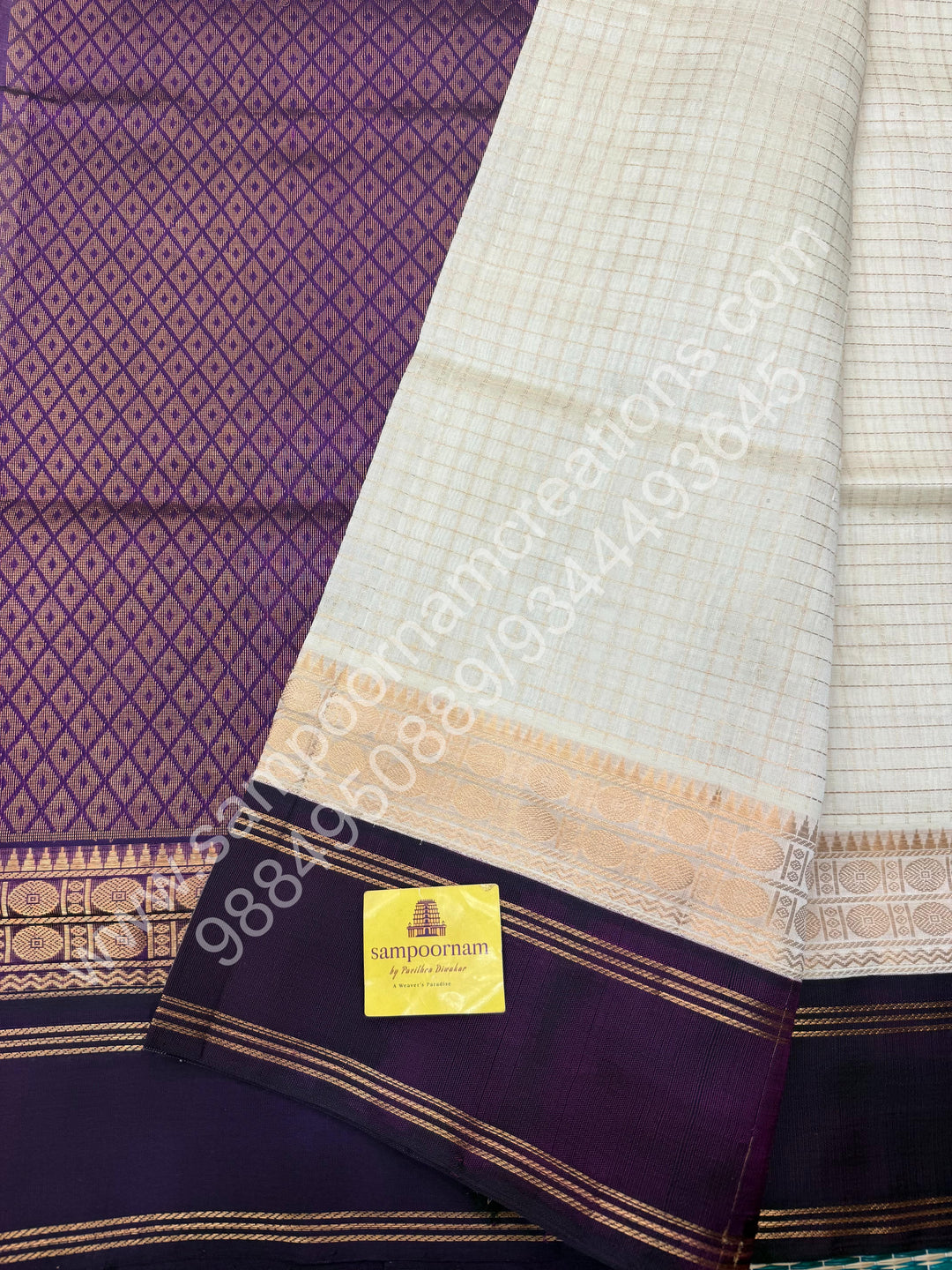 Offwhite with Wine  , Zari checks in the body , rich borders with traditional Pallu Korvai Silk Cotton Saree