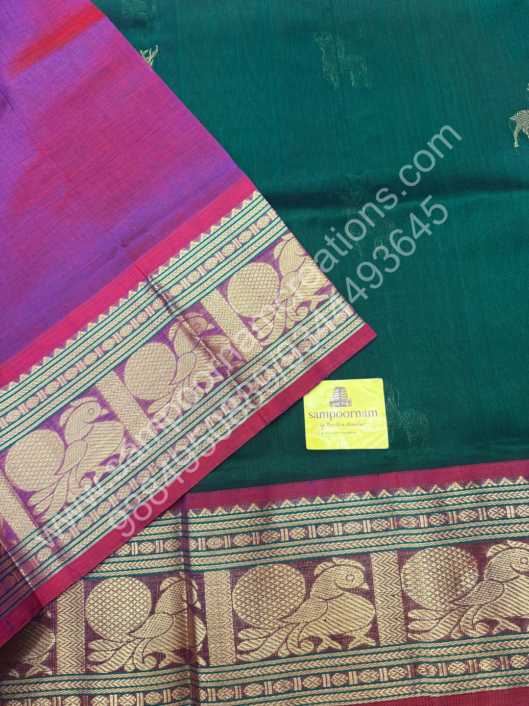 Dark Green with Magenta  , rich Zari  deer butta in the body , one side long traditional Borders and Grand Pallu Korvai Silk Cotton Saree
