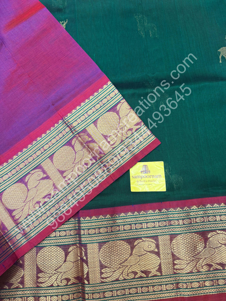 Dark Green with Magenta  , rich Zari  deer butta in the body , one side long traditional Borders and Grand Pallu Korvai Silk Cotton Saree
