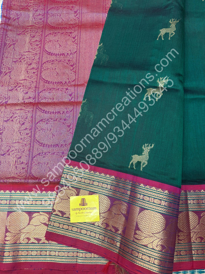 Dark Green with Magenta  , rich Zari  deer butta in the body , one side long traditional Borders and Grand Pallu Korvai Silk Cotton Saree