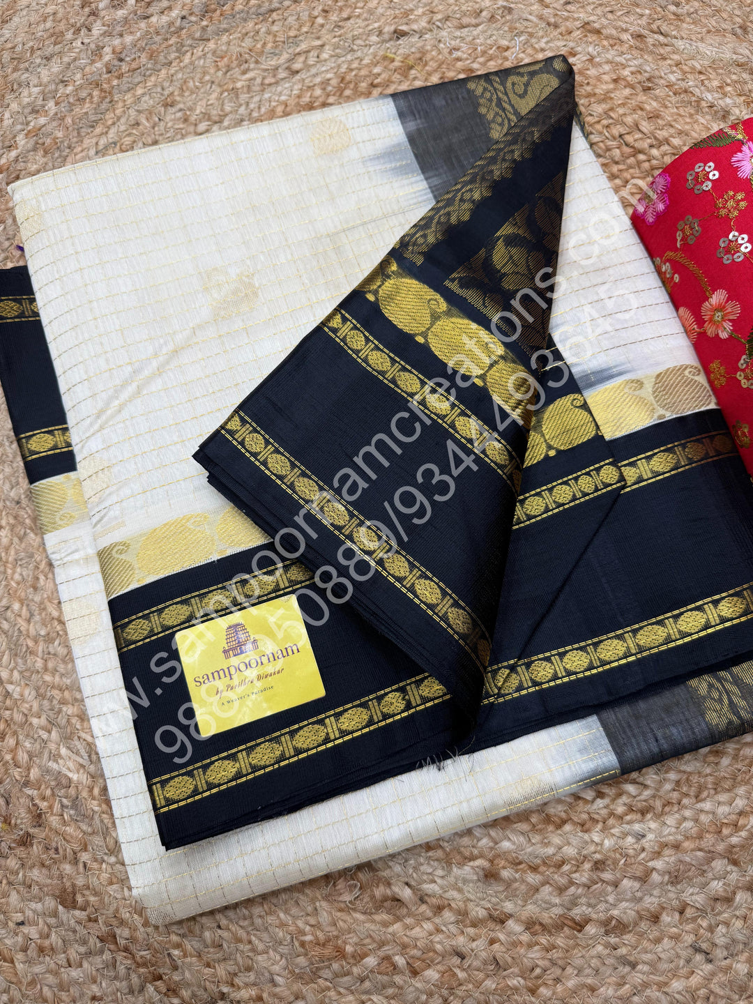 Cream with Black  , Zari checks , Mayil and Chakram rich butta in the body , rich borders with traditional Pallu Korvai Silk Cotton Saree