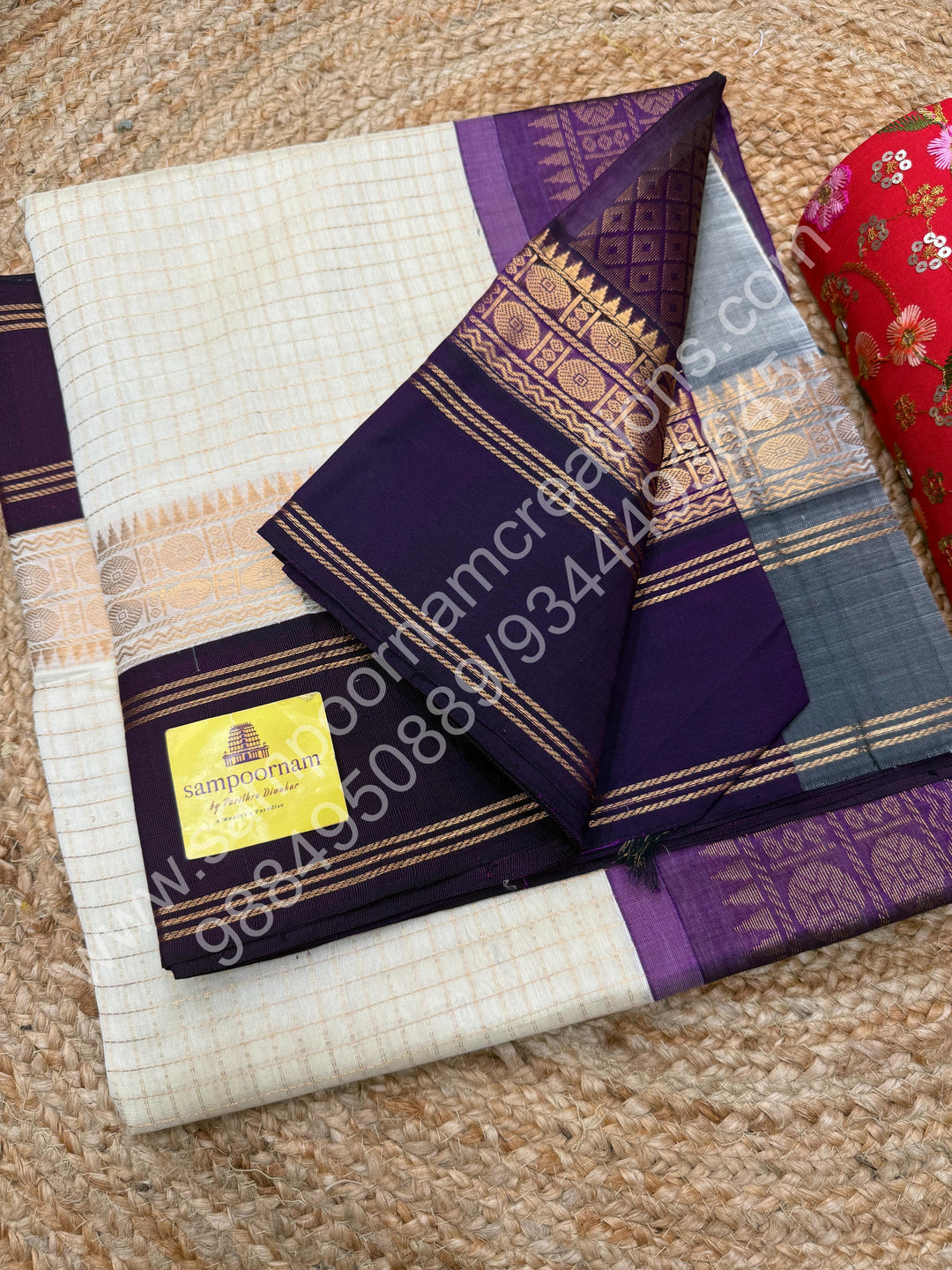 Offwhite with Wine  , Zari checks in the body , rich borders with traditional Pallu Korvai Silk Cotton Saree