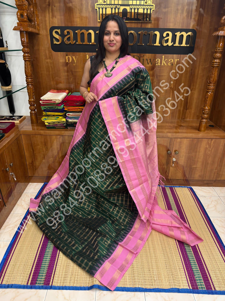 Dark Green with Baby Pink  , rich Zari checks in the body , Temple designs with Rettapet Borders and Grand Pallu Korvai Silk Cotton Saree