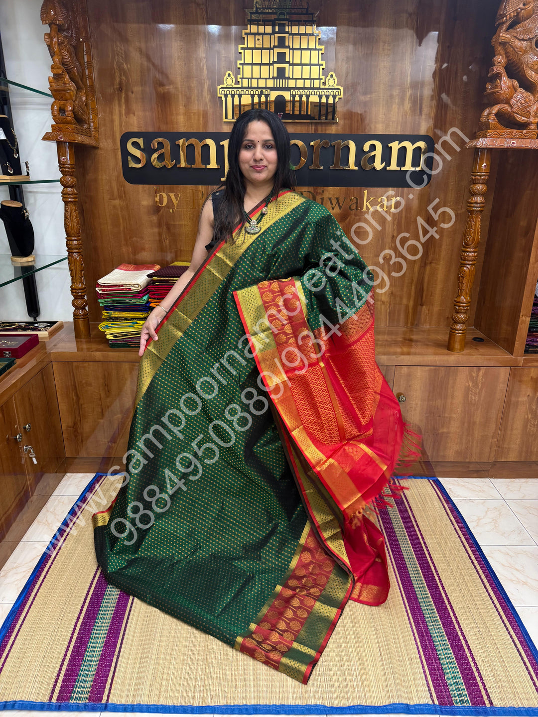 Green with Red  , rich Zari Lakshadeepam butta in the body , one side long traditional Borders and Grand Pallu Korvai Silk Cotton Saree
