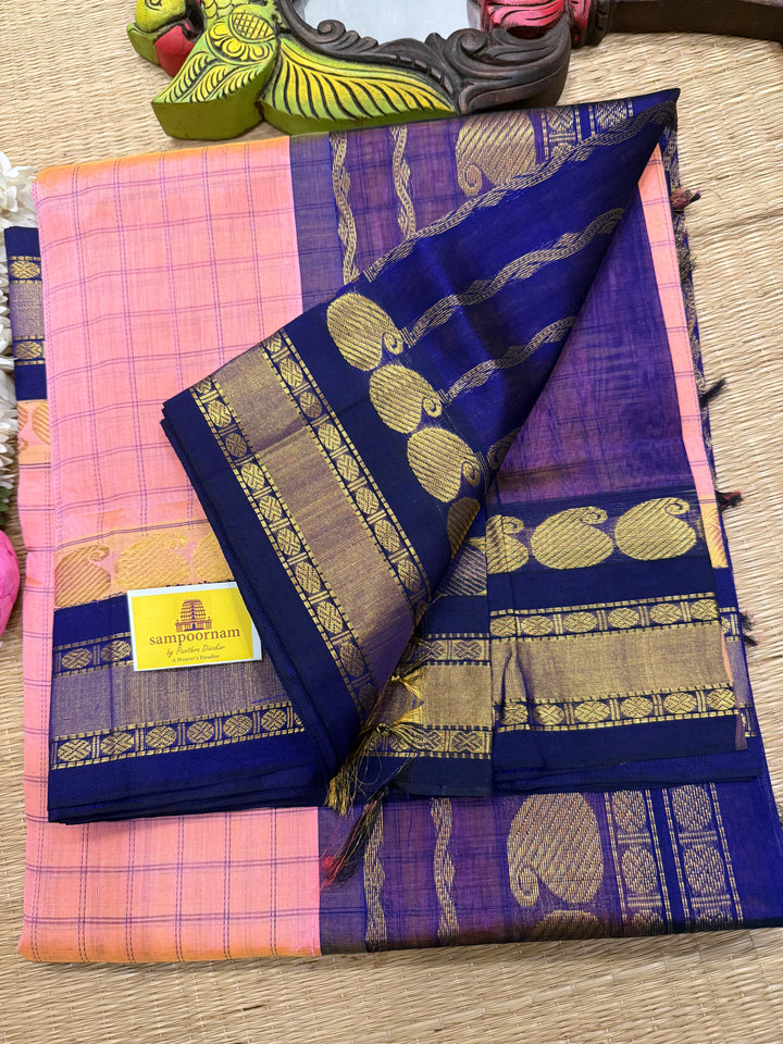 Peachish  Pink with Blue , kattam in the body , traditional borders and rich Pallu Korvai Silk Cotton Saree