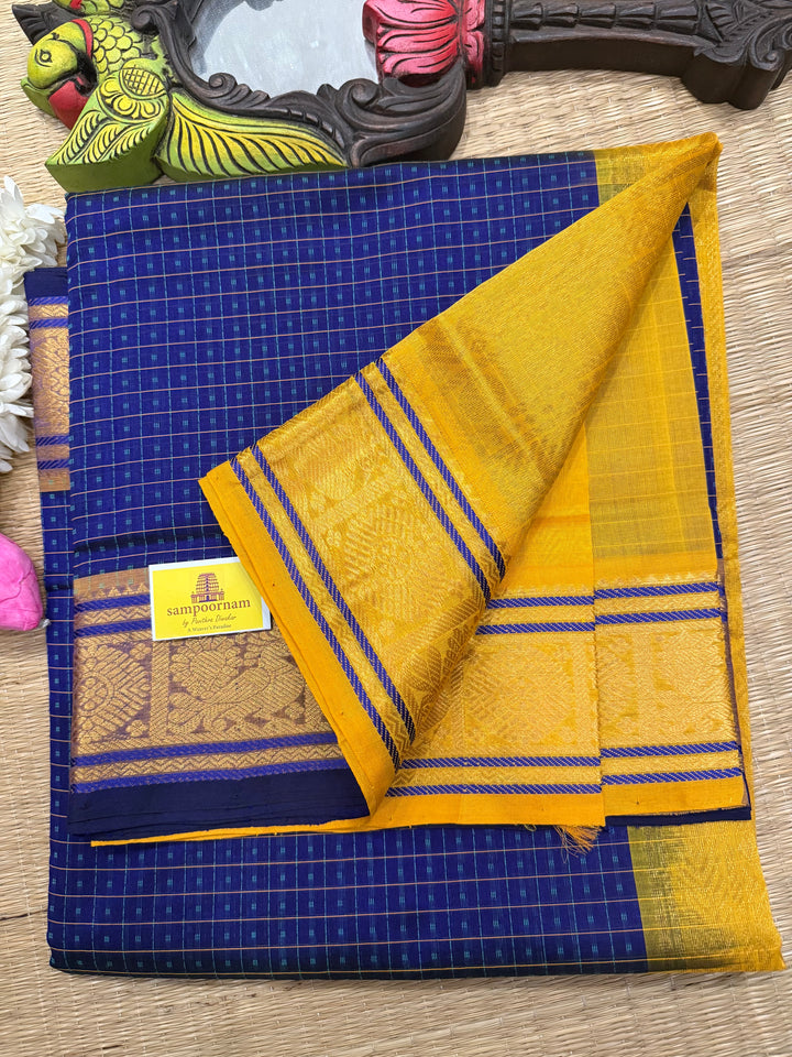 Blue with Yellow , Lakshadeepam butta in the body , traditional borders and rich Pallu Lakshadeepam Silk Cotton Saree
