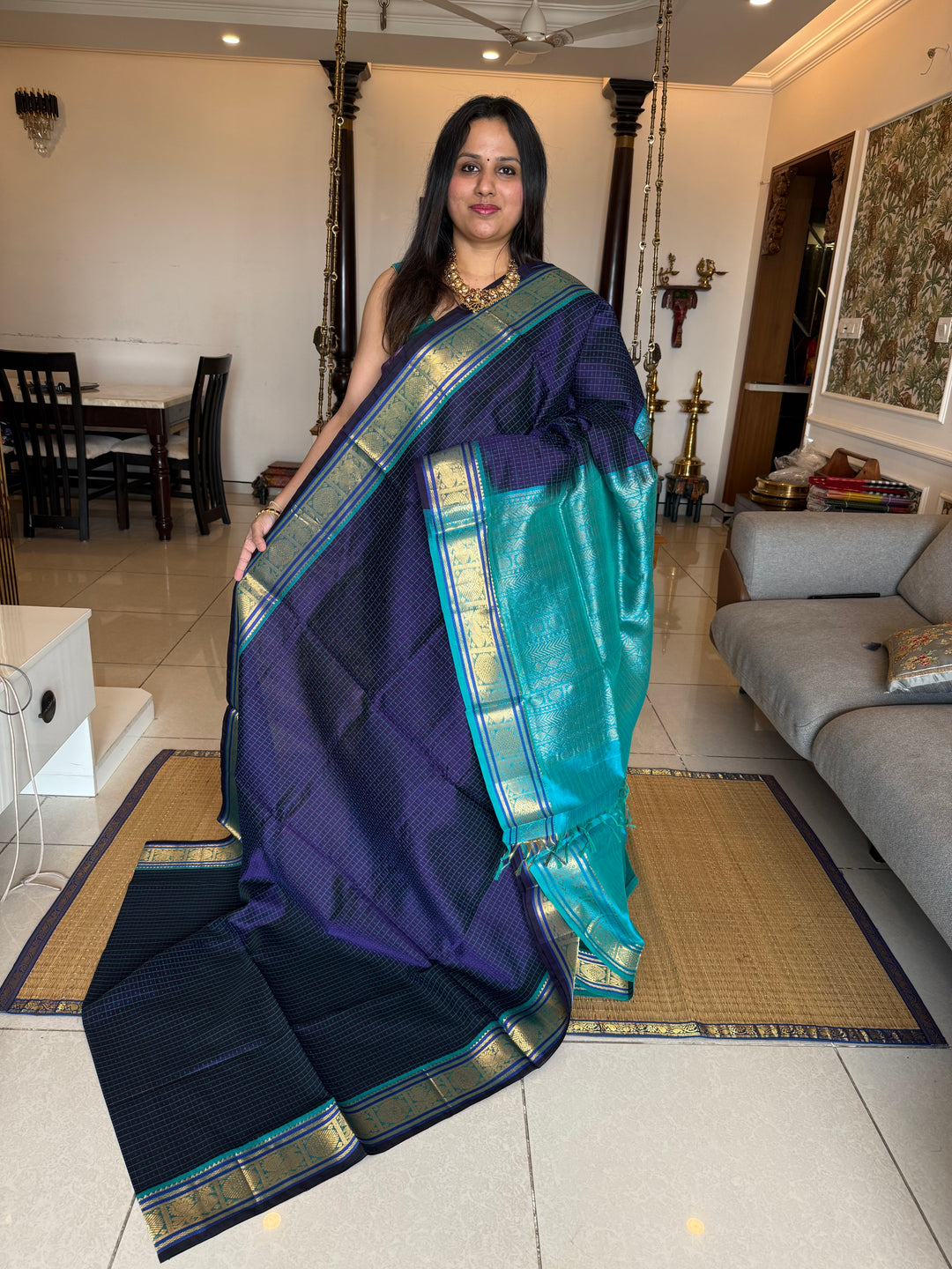 Dark Blue with Light Blue , Lakshadeepam butta in the body , traditional borders and rich Pallu Lakshadeepam Silk Cotton Saree