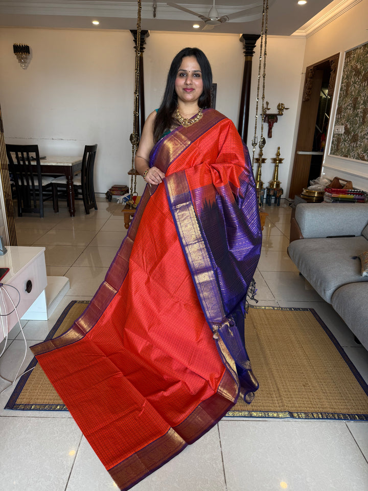 Orange with Blue , Lakshadeepam butta in the body , traditional borders and rich Pallu Lakshadeepam Silk Cotton Saree