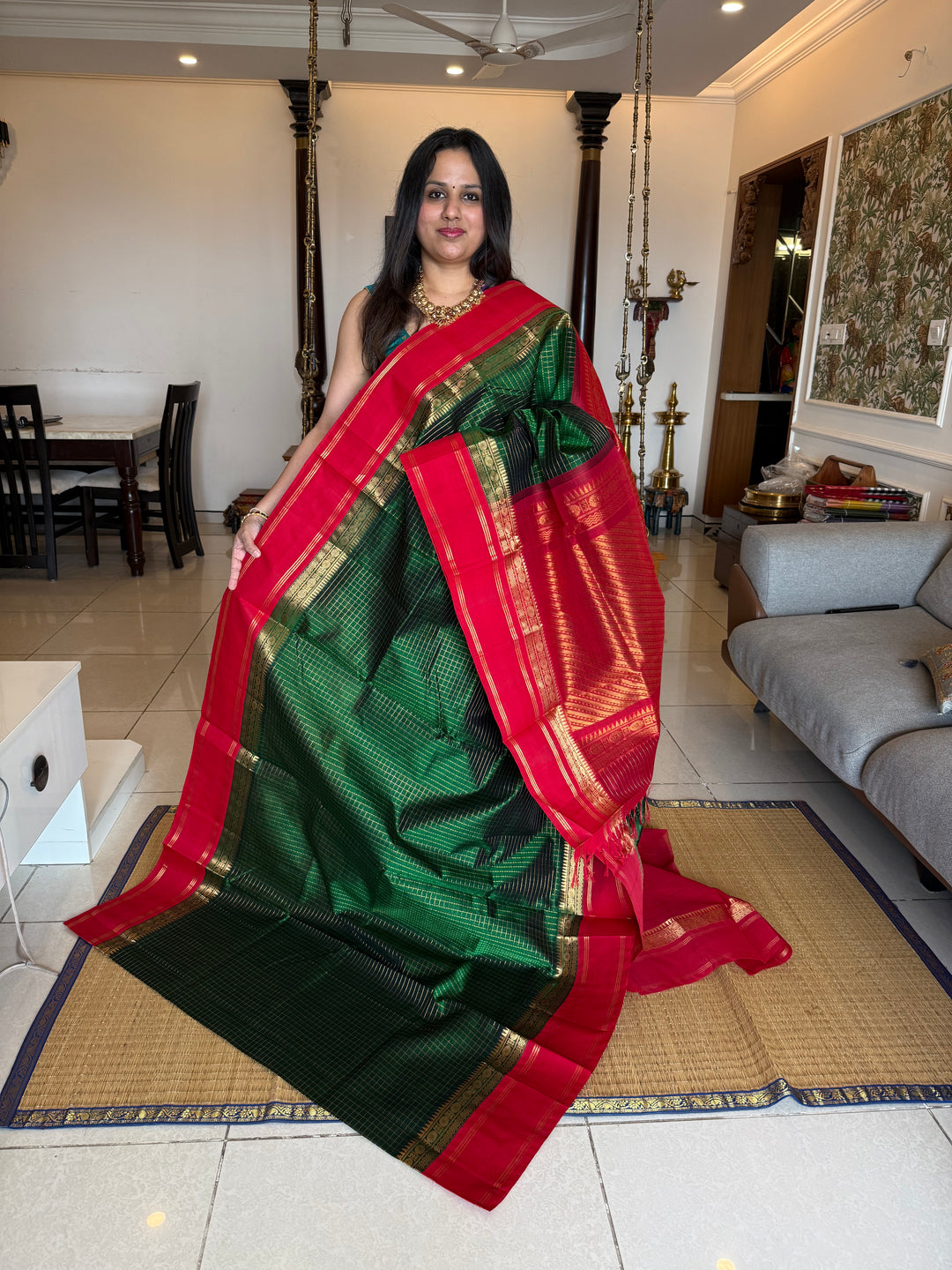 Green with Red , rich zari checks in the body , rettapet border and rich Pallu Korvai Silk Cotton Saree