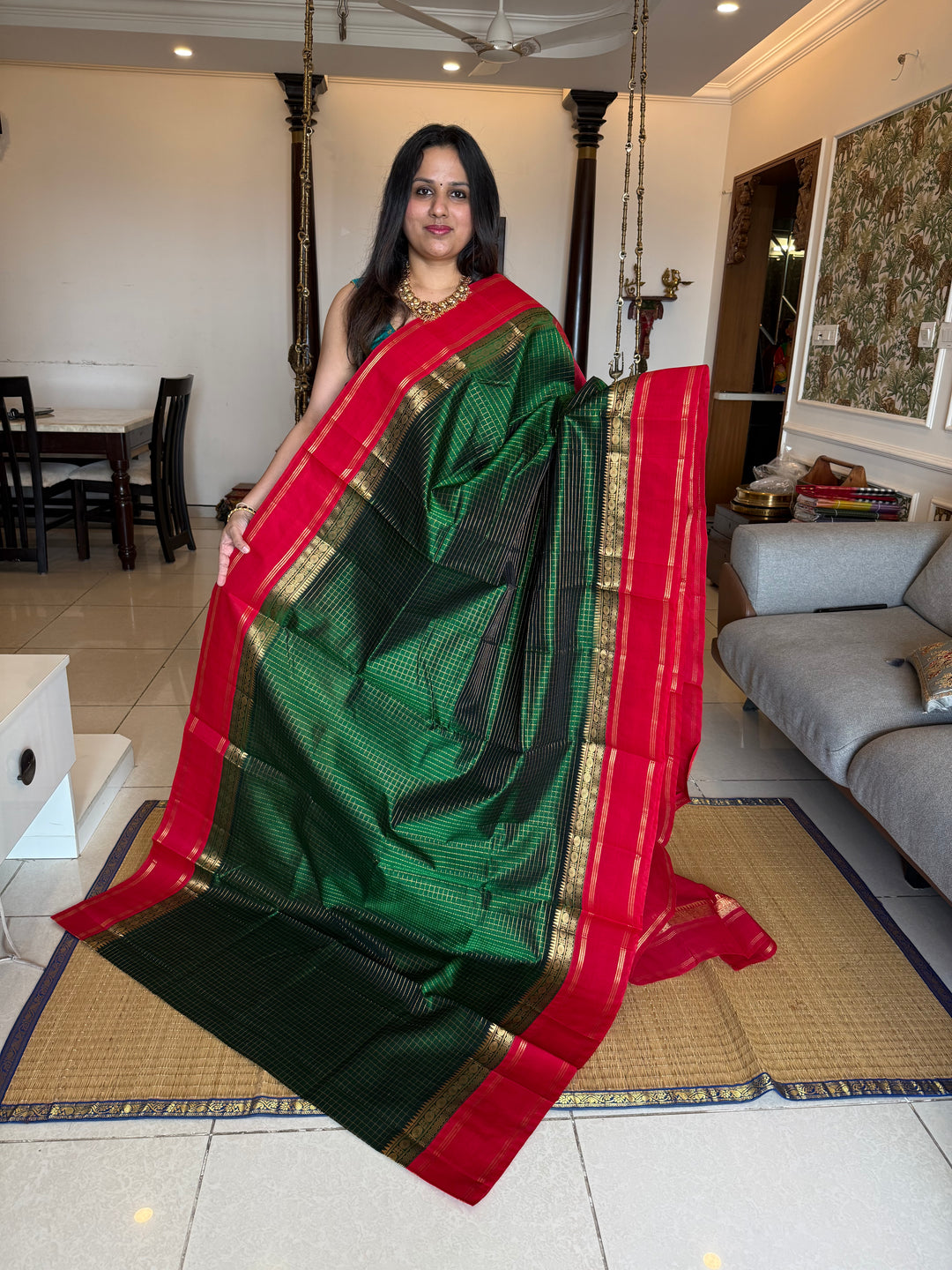Green with Red , rich zari checks in the body , rettapet border and rich Pallu Korvai Silk Cotton Saree